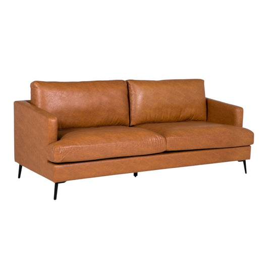 Harlow 3 Seater sofa at angle showing full width and warm tan faux leather upholstery