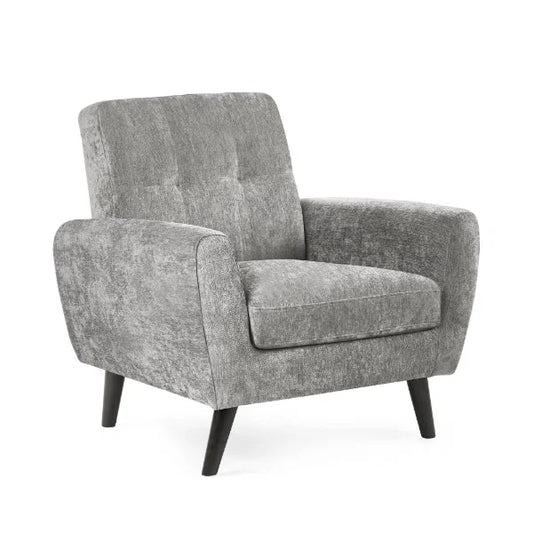 Parker armchair at angle showing seat depth and arm profile in grey velvet fabric