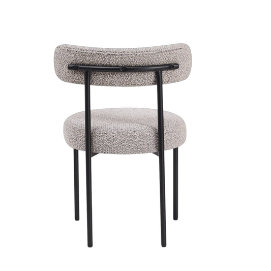 Connor dining chair rear view showing curved backrest profile and black powder-coated steel frame
